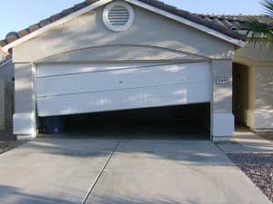 Garage door off track repair